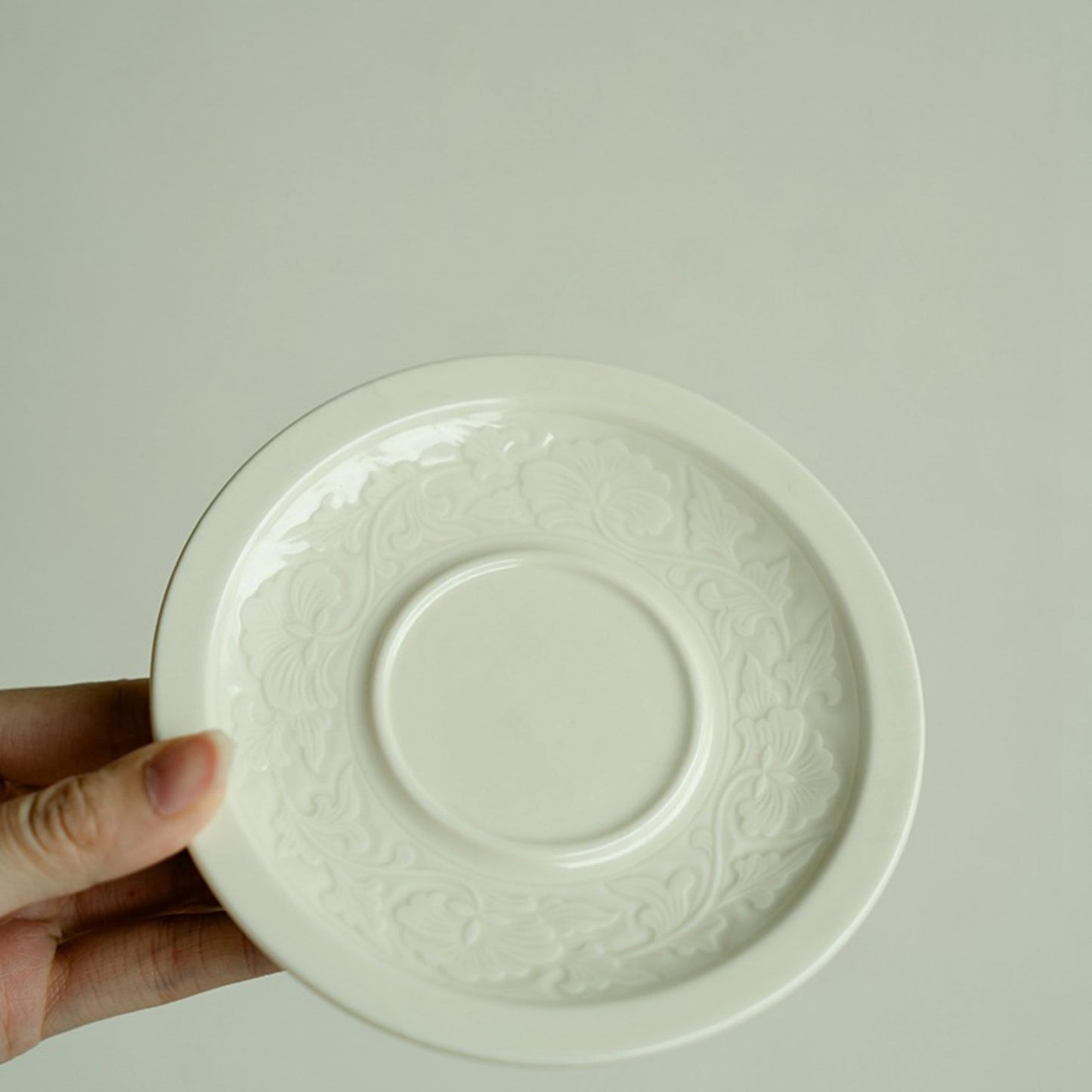 Ding Kiln Magnolia Pattern Ceramic Tea Cup with Saucer