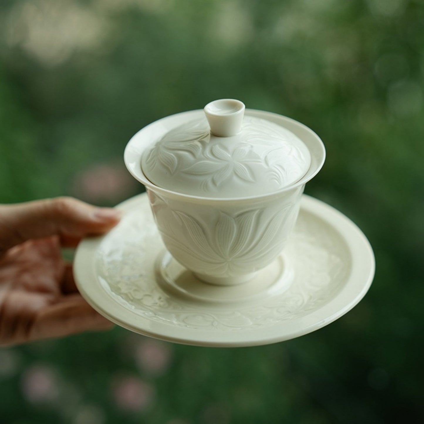 Ding Kiln Magnolia Pattern Ceramic Tea Cup with Saucer