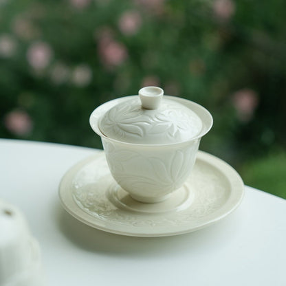 Ding Kiln Magnolia Pattern Ceramic Tea Cup with Saucer