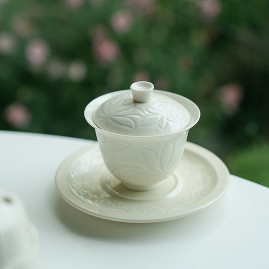 Ding Kiln Magnolia Pattern Ceramic Tea Cup with Saucer